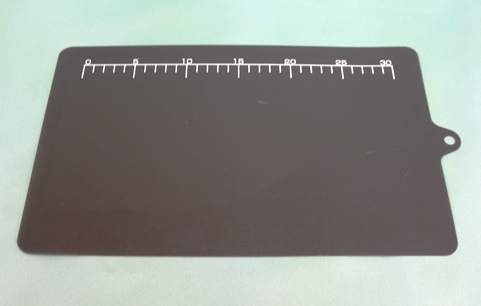 黒色シートまな板の写真